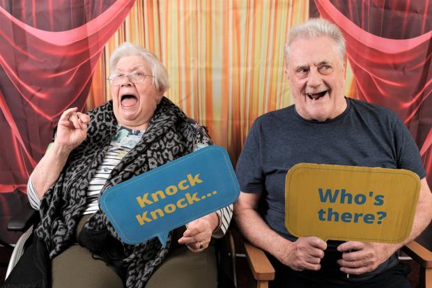 The Bolton News: Residents Janet Tait and Michael Allison enjoy a joke together